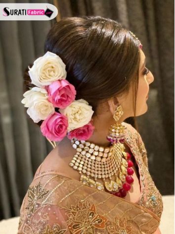 Elegant Pink Lehenga | Bridal floral headpiece, Indian bridal hairstyles,  Bridal bun