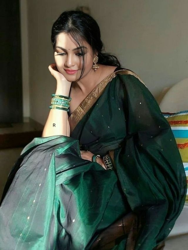 Face Rested on Hand Sitting Saree Pose