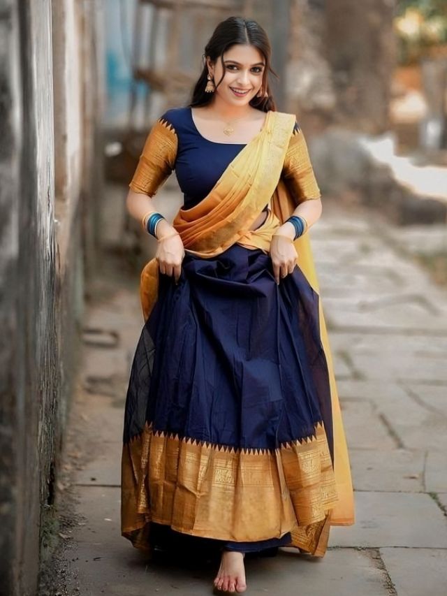 Half saree pose for photoshoot for girl standing