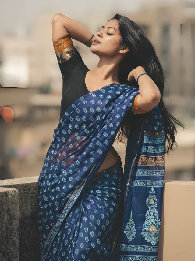 Holding Hair Saree Pose on Rooftop