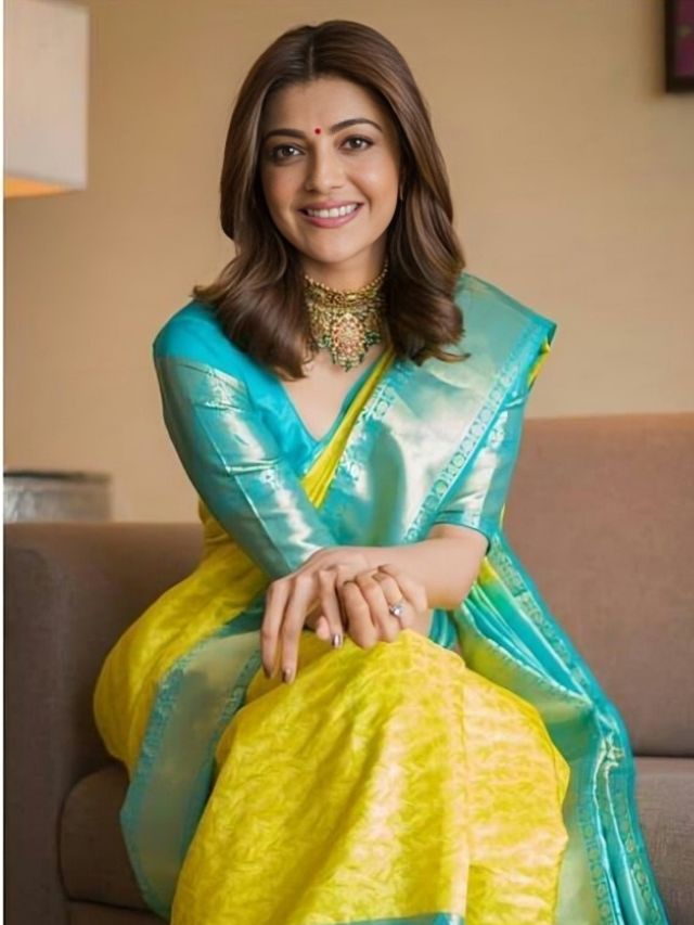 Kajal Aggarwal with Cross Legged Saree Pose