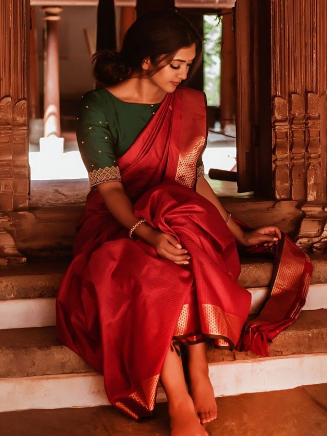 Knee Hugging Saree Pose