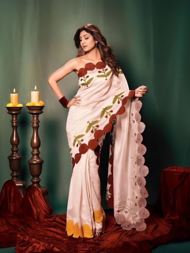 Shilpa Shetty Looking at Opposite Side of Saree Pallu Pose