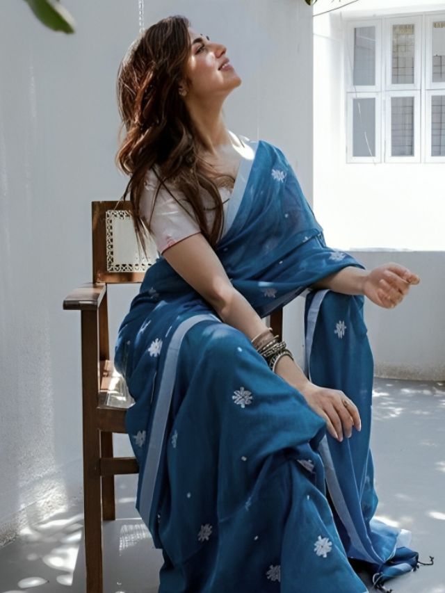 Sitting on Chair at Rooftop Saree Pose