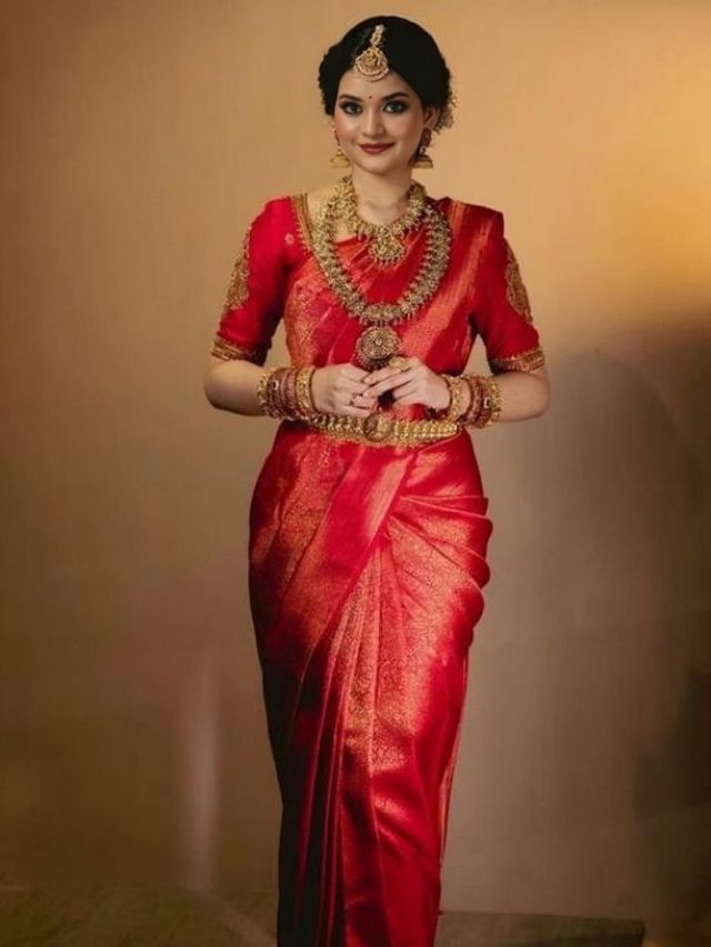 South indian Red bridal standing saree pose