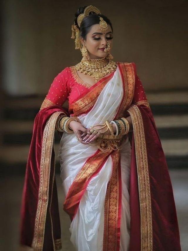 White and Red Nauvari Saree Pose