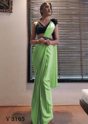 Fancy Silk Saree In Neon Green Color By Surati Fabric