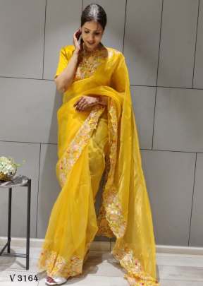 Organza Silk Saree In Turmeric Yellow By Surati Fabric