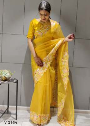 Organza Silk Saree In Turmeric Yellow By Surati Fabric