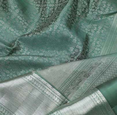 graceful shade With  traditional border Pista Color Saree